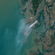 Illustration for article titled Mumbai's Garbage Fire Is So Huge You Can See It From Space